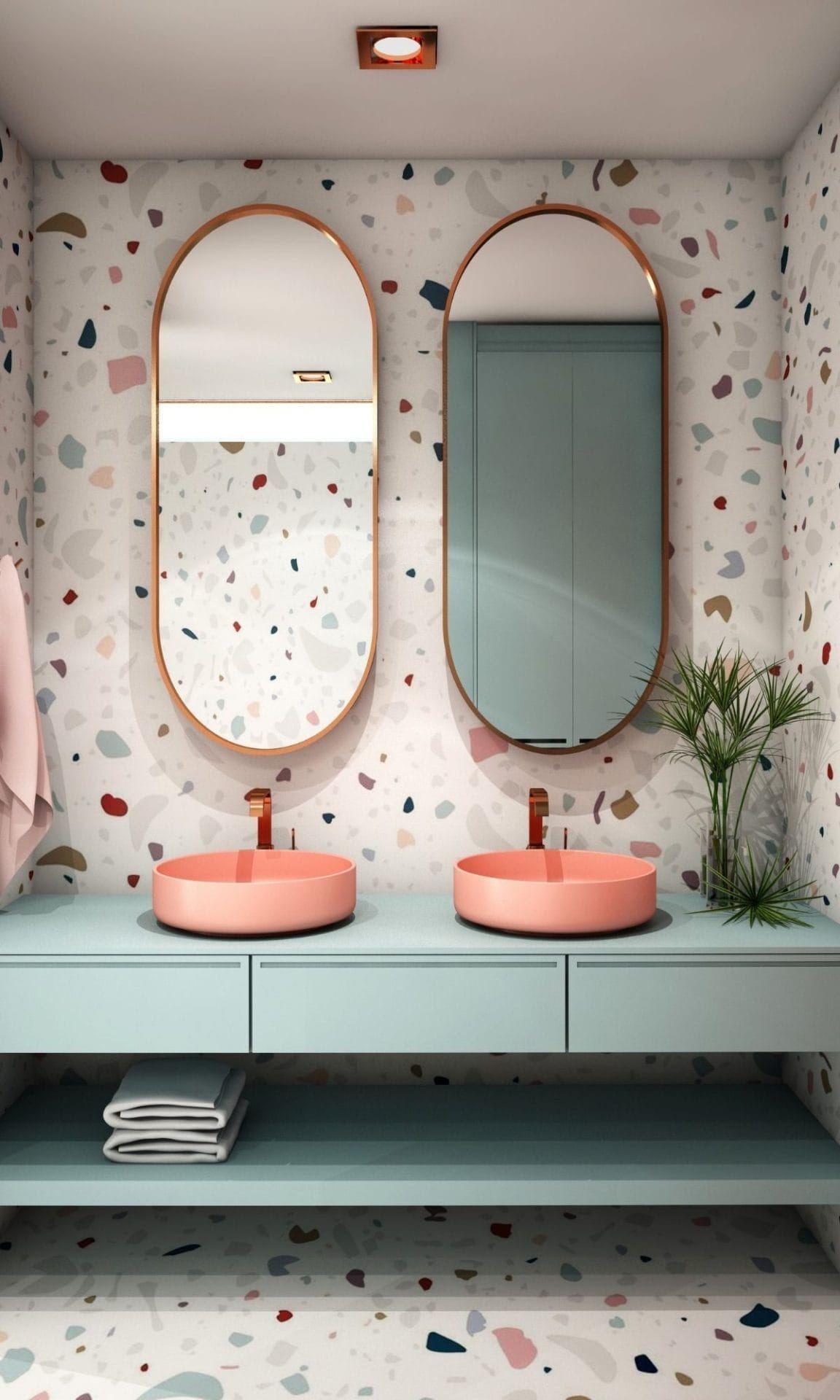 Bathroom mirrors with white, green and grey terrazzo tiling